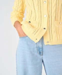 Cardigan maille ajourée et torsades