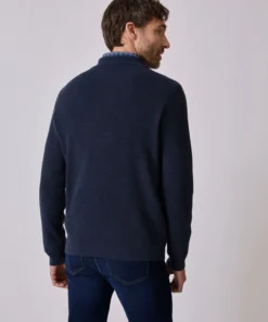 Pull Thermolactyl col polo en maille texturée.