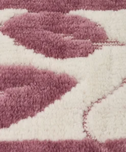 Tapis de bain motif feuilles.
