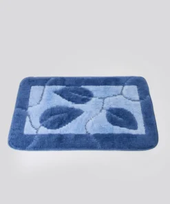 Tapis de bain motif feuilles.